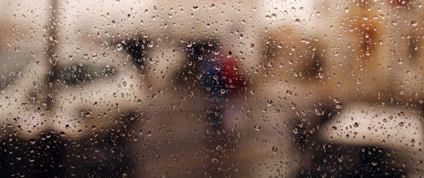 rain drops banner on the window. drops of water from the rain flow down the glass. Rainfall, Drip, Raining, Droplets of water