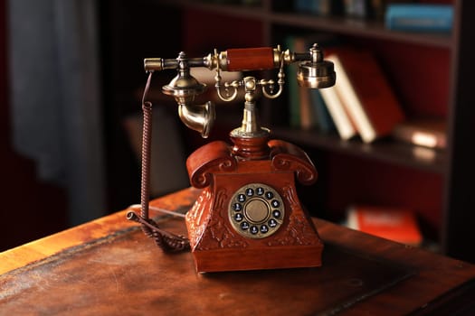 Old vintage retro telephone station. Great interior object. Old fashioned telephone. Vintage red phone