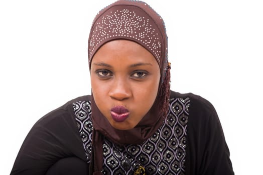 young muslim woman getting ready for prayer.