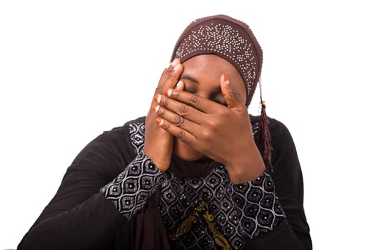 young muslim woman getting ready for prayer.
