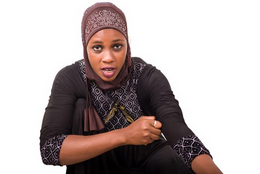 young muslim woman getting ready for prayer.