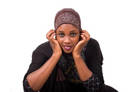 young muslim woman getting ready for prayer.