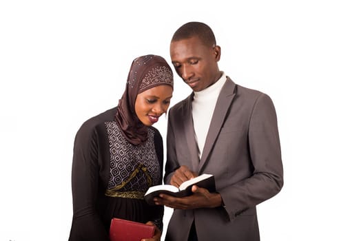 two religious people standing and learning together