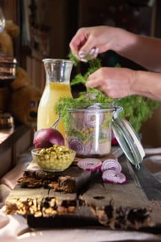 appetizer of herring with onions marinated in mustard-vinegar sauce with dill and green peas, recipe. High quality photo