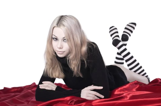 young beauty girl with naked buttocks and striped socks on red
