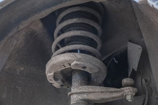old dirty tie rod end and shock absorber.