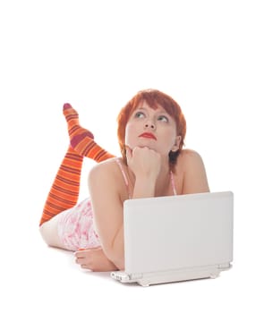 Red Girl in stripe socks with laptop on white background
