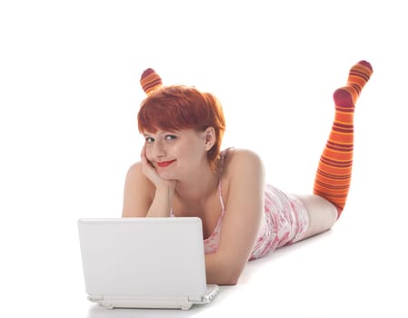 Red Girl in stripe socks with laptop on white background