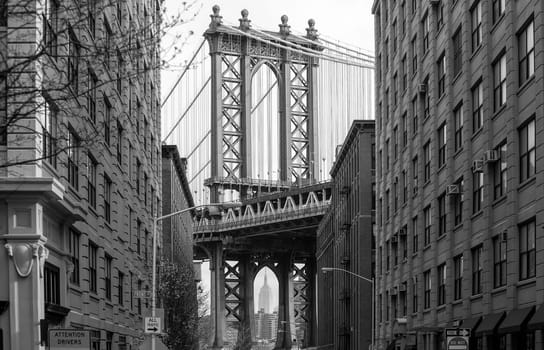  Manhattan Bridge in New York City in USA from Dumbo, Brooklyn in black and white