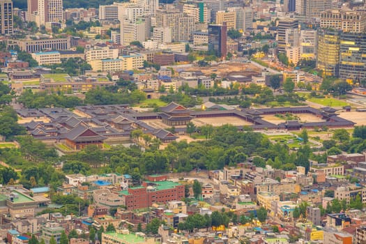 Gyeongbokgung Palace in downtown Seoul at sunset in South Korea from top view