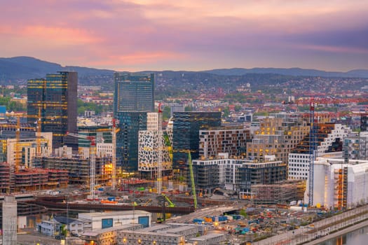  Oslo waterfront downtown city skyline cityscape in Norway at sunset from top view