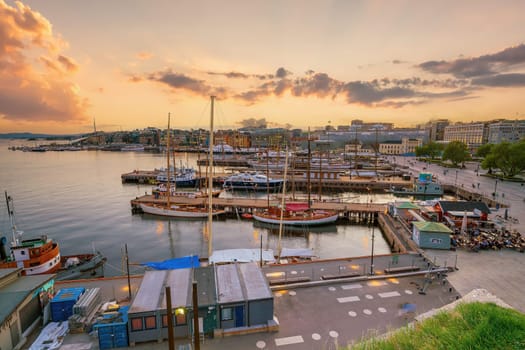  Oslo waterfront downtown city skyline cityscape in Norway at sunset