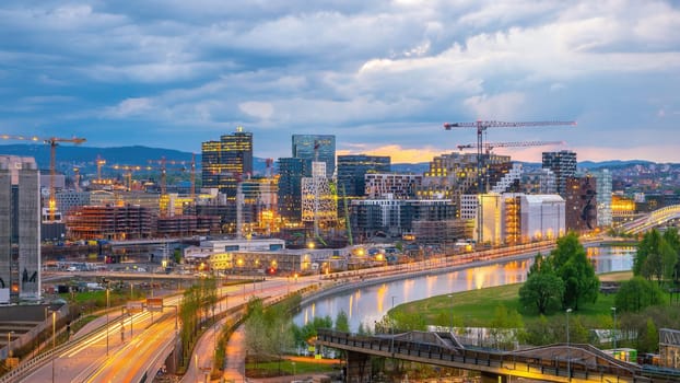  Oslo waterfront downtown city skyline cityscape in Norway at sunset from top view