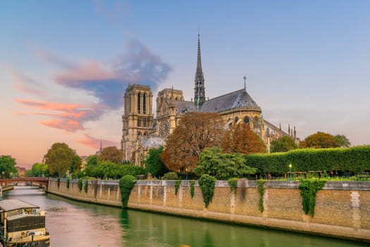 Paris city skyline with Notre Dame de Paris cathedra, cityscape of France at sunrise