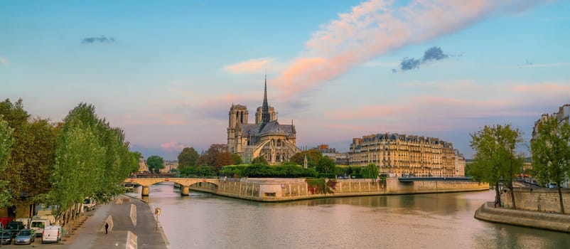 Paris city skyline with Notre Dame de Paris cathedra, cityscape of France at sunrise
