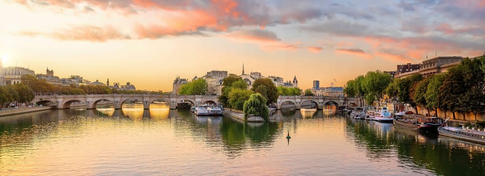 Paris city skyline with Seine river, cityscape of France at sunset