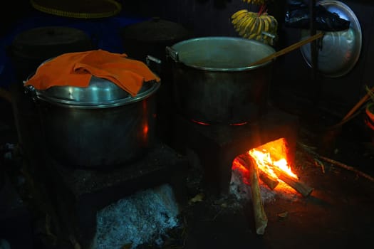 Javanese traditional kitchen with the fire wood stoves called pawon.