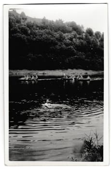 THE CZECHOSLOVAK SOCIALIST REPUBLIC - CIRCA 1950s: Retro photo shows swimmer in the river Summer vacation theme. Vintage black and white photography.