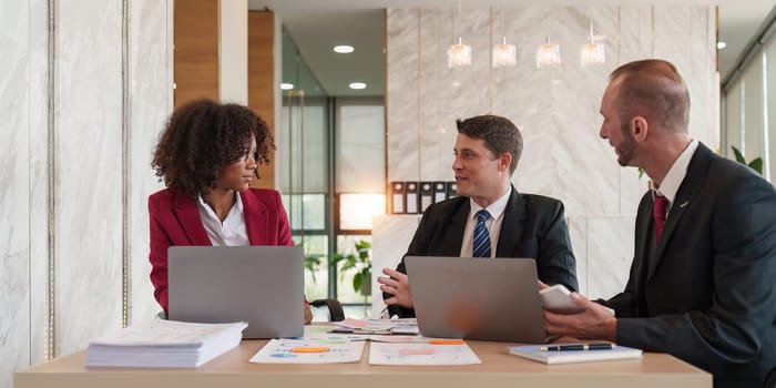 Diverse Multiethnic Business people in meeting. Accountant people do paperwork, tax, accounting and Financial advisor concept.