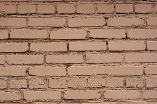 Old brown stone wall Close-up Background of stone tiles with detailed natural texture.