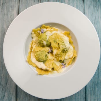 Recipe for Homemade Italian Ravioli pasta with Spinach and Ricotta Filling. High quality photo