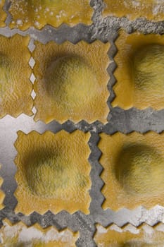 Recipe for Homemade Italian Ravioli pasta with Spinach and Ricotta Filling. High quality photo