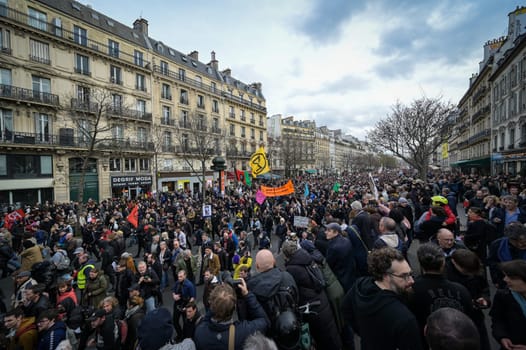 France, Paris, 2023-03-23. Demonstration, Strike, Ninth day of mobilisation against the pension reform. The Parisian procession, near Republique Place, High quality photo