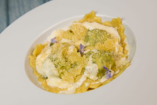 Recipe for Homemade Italian Ravioli pasta with Spinach and Ricotta Filling. High quality photo