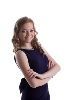 Smiling young woman posing in dark blue dress, close-up