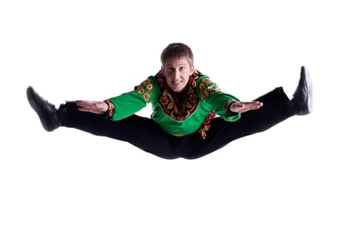 Young folk dancer posing in studio, isolated on white