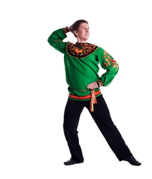 Cheerful man performing folk dance in studio, isolated on white