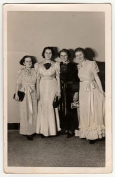 TABOR, THE CZECHOSLOVAK REPUBLIC - FEBRUARY 5, 1939: Vintage photo shows a dancers - girls pose during the dancing lessons. Retro black and white photography. Circa 1940s.
