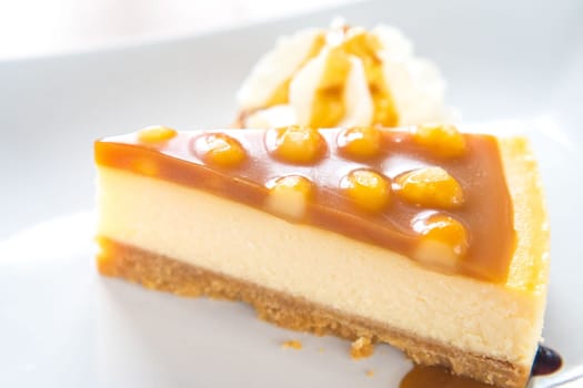 macadamia caramel cake on a plate cuisine dessert sweet food.