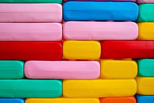 background of colored plastic rectangles. Colorful toy bricks for kid. High quality photo.