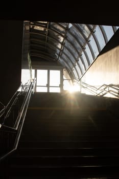 Sunlight on a dark staircase close up