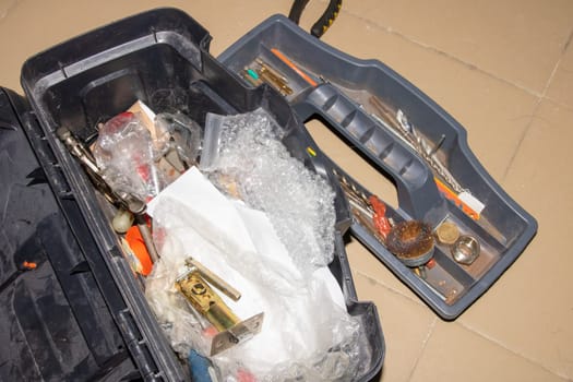 Plastic tool box on the floor close up