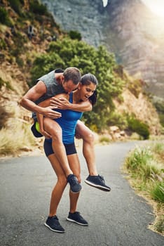 More strong than I thought. a young attractive couple training for a marathon outdoors