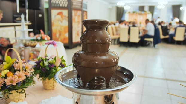 Chocolate fountain at a wedding celebration