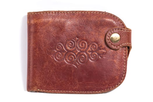 Brown leather wallet with Kazakh national embossed ornament on a white background.