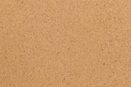 Cork background in beige color. Brown cork texture.