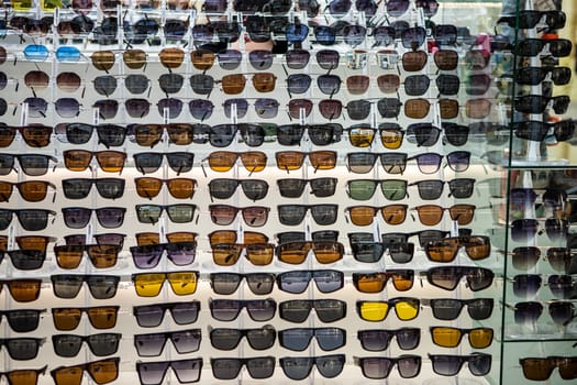 many different full-screen protective sunglasses. summer season.