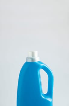 Blue plastic liquid detergent bottle isolated on white background. Laundry container, merchandise template. Product design. Mock up