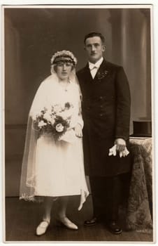 THE CZECHOSLOVAK REPUBLIC - CIRCA 1930s: Vintage photo shows newlyweds. Retro black and white wedding photography.