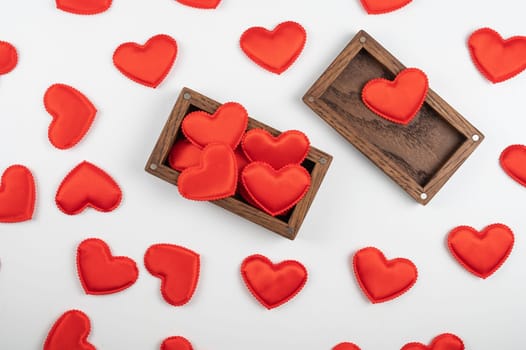 Valentine day white wood background with gift box with red hearts. Valentines day or love concept, copy space