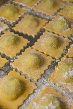 Recipe for Homemade Italian Ravioli pasta with Spinach and Ricotta Filling. High quality photo