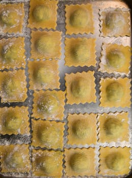 Recipe for Homemade Italian Ravioli pasta with Spinach and Ricotta Filling. High quality photo