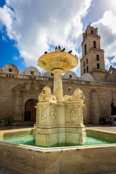 The Fountain of lions in Plaza de San Francisco, in front of the Basílica Menor of San Francisco de Asís, Old Havana, Cuba