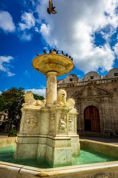 The Fountain of lions in Plaza de San Francisco, in front of the Basílica Menor of San Francisco de Asís, Old Havana, Cuba