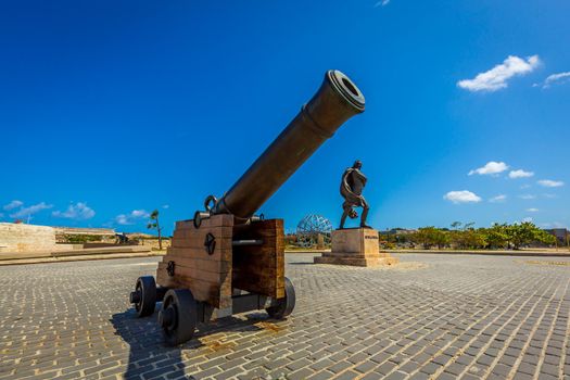 Statue of Francisco de Miranda, with Cannon in foreground, located on the Malecón in Havana, Cuba