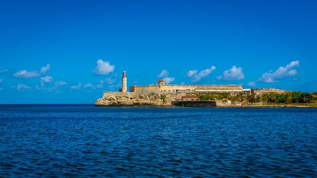 Morro Castle (Castillo del Morro) and lighthouse across Havana harbor, Havana, Cuba